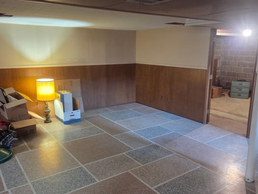 Same basement cleared and broom-swept after the estate cleanout in Oakland Mills, Columbia, MD