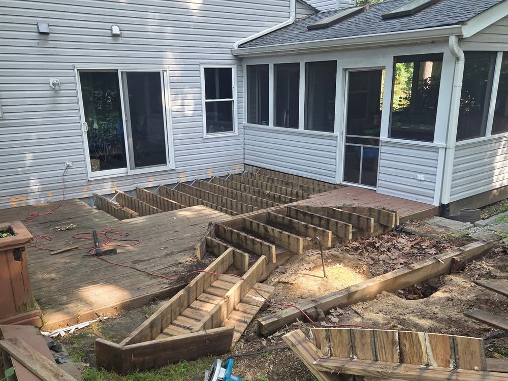 Deck stripped to joists and framing partway through demolition in Ellicott City, MD