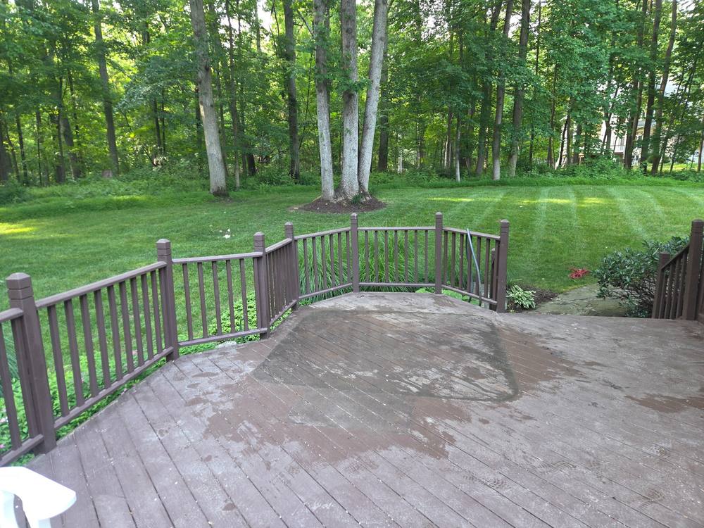 Clear deck showing the outline where a hot tub stood after removal in Ellicott City, MD