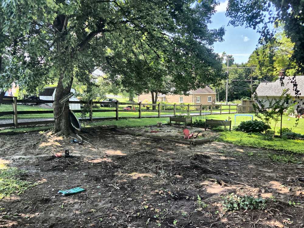 Cleared dirt yard where a large playground was demolished and hauled away in Fulton, MD