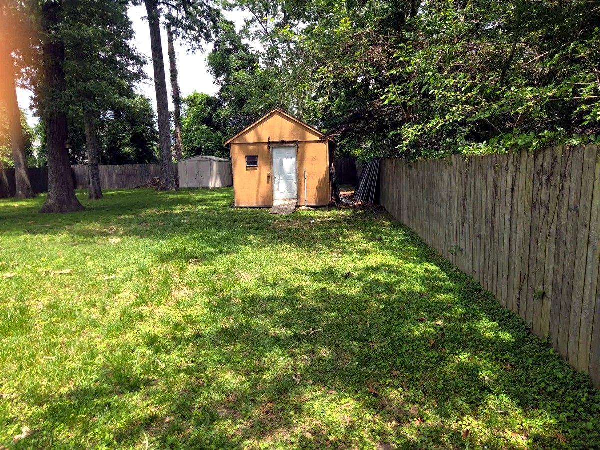 Cleaned-up backyard and emptied shed at a Gambrills home off Braun Avenue after MD Junk Pros finished the cleanout