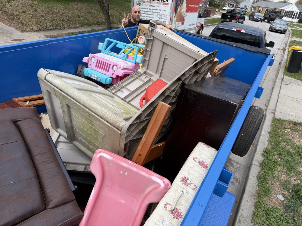 MD Junk Pros dump trailer loaded with cleanout debris hauled from the Jupp Road house in Glen Burnie, MD