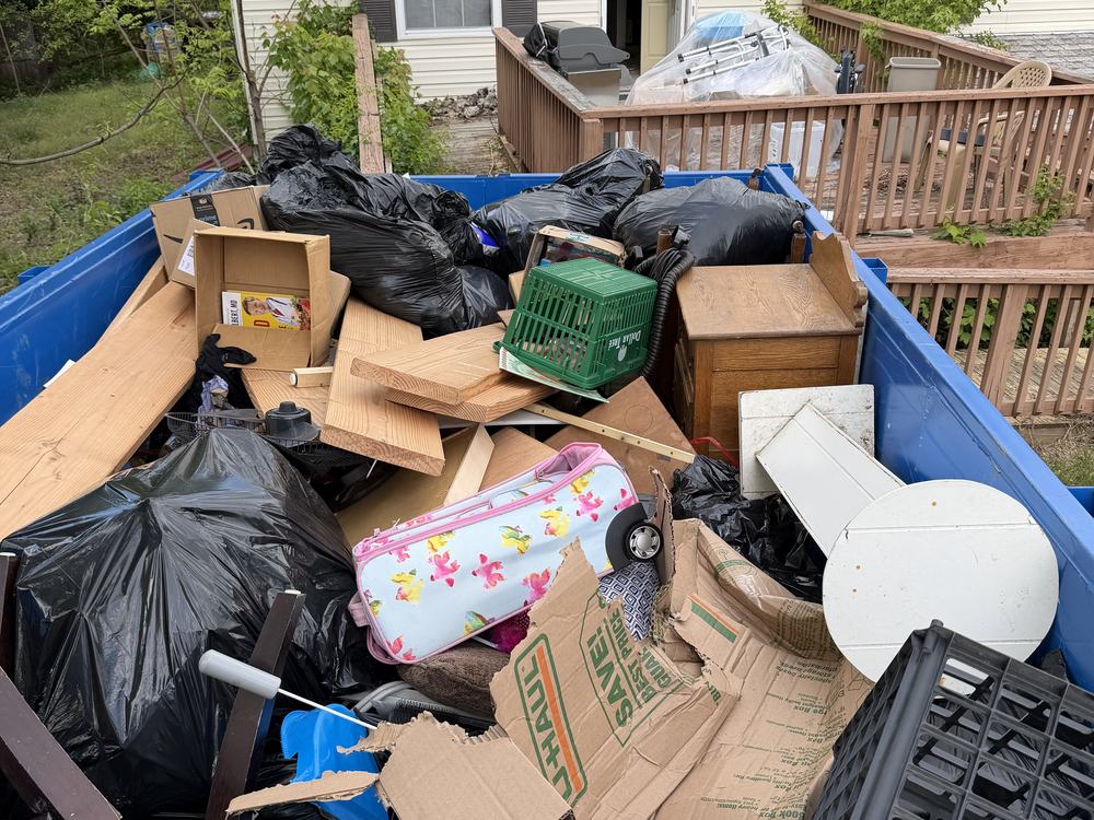 MD Junk Pros dump trailer loaded with a household's worth of estate cleanout debris in Severn, MD